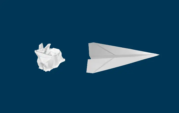 white paper plane on white background